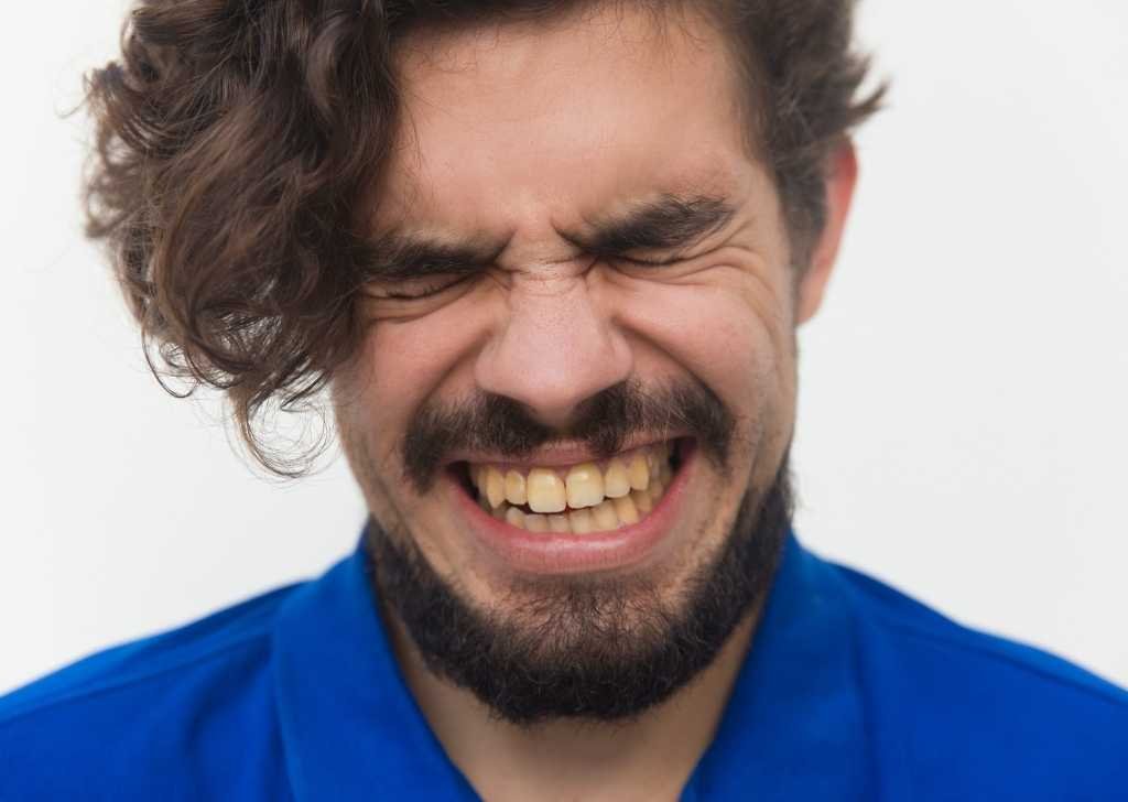 Wondering why you have really yellow teeth? Discover 5 major causes and how to whiten them safely, even after braces or years of discolouration.