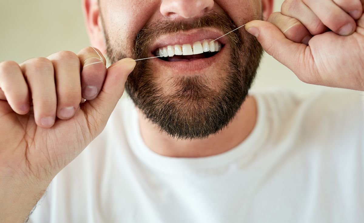 Dental bridge flossing